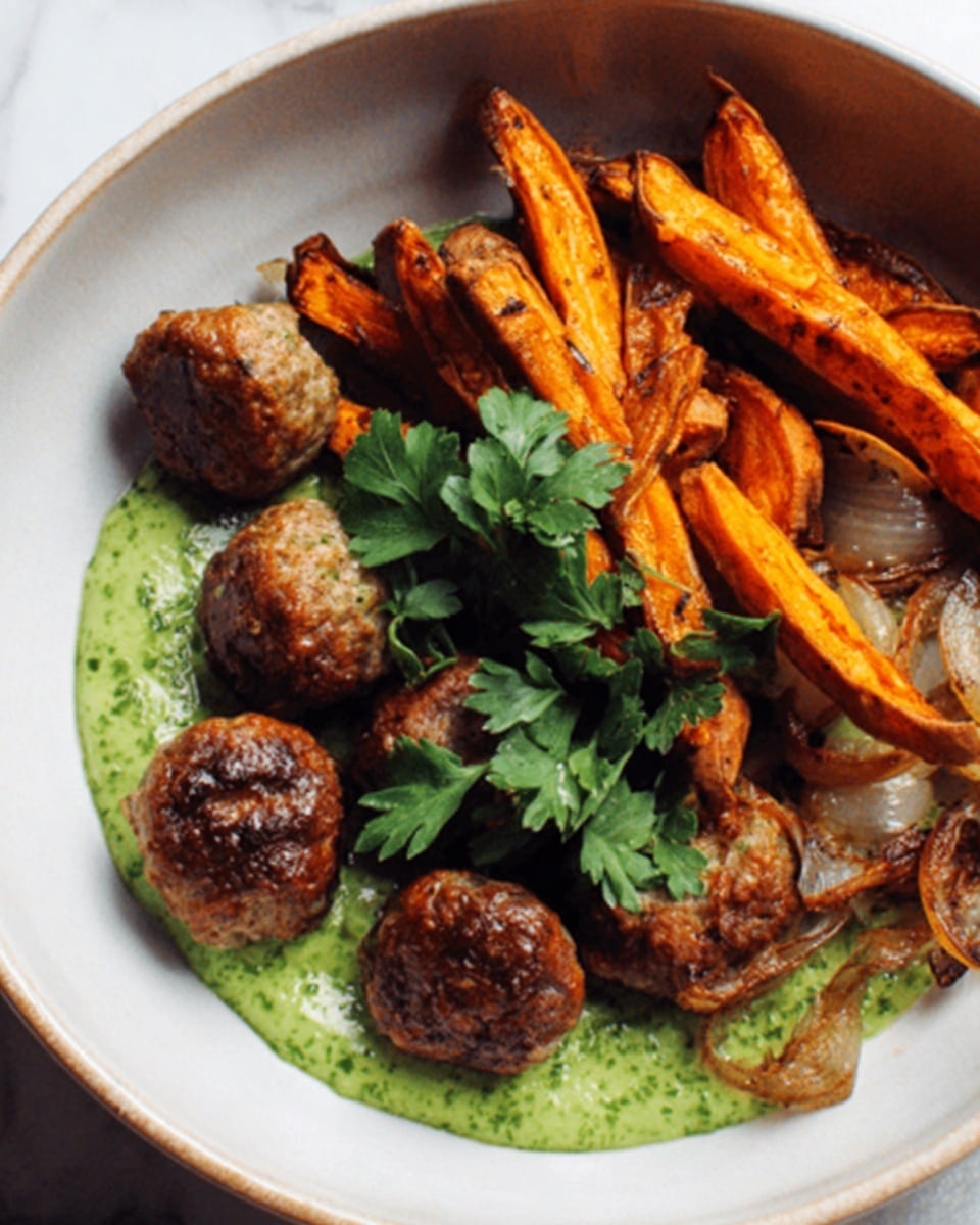 A white bowl holds a dish with three main layers: at the bottom is a smooth, light green sauce spread in a circle; on top of it are crispy golden-brown roasted potato slices with some browned edges, mixed with caramelized thin onion slices; on the top layer are several golden-brown meatballs, looking juicy and well-cooked, nestled near fresh green cilantro leaves. The bowl sits on a white marbled surface. Photo taken with an iphone --ar 4:5 --v 7